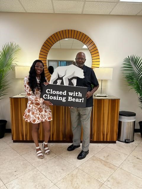 Ronald (right) with Self-Help Loan Officer Vanessa (left)