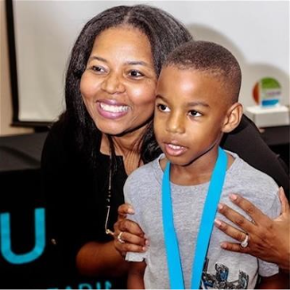 Toiya (left) with one of her students (right)
