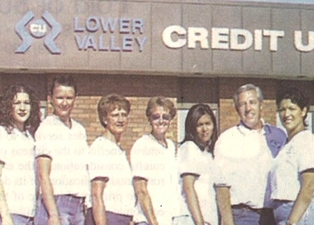 several employees of Lower Valley Credit Union standing outside of Lower Valley Credit Union